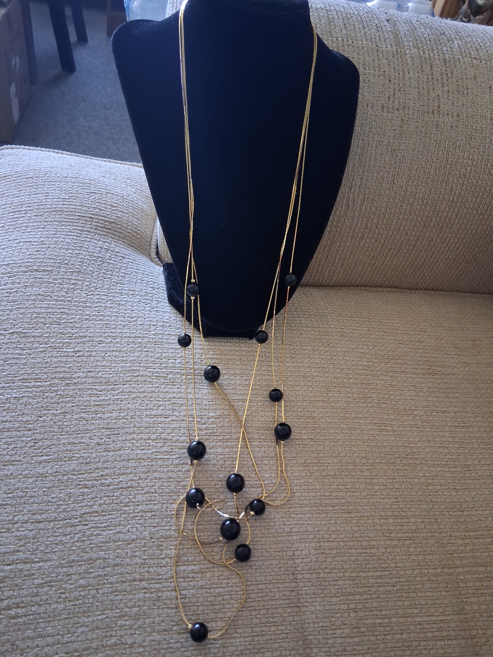 Layered Gold Necklace with Black Bead Accents